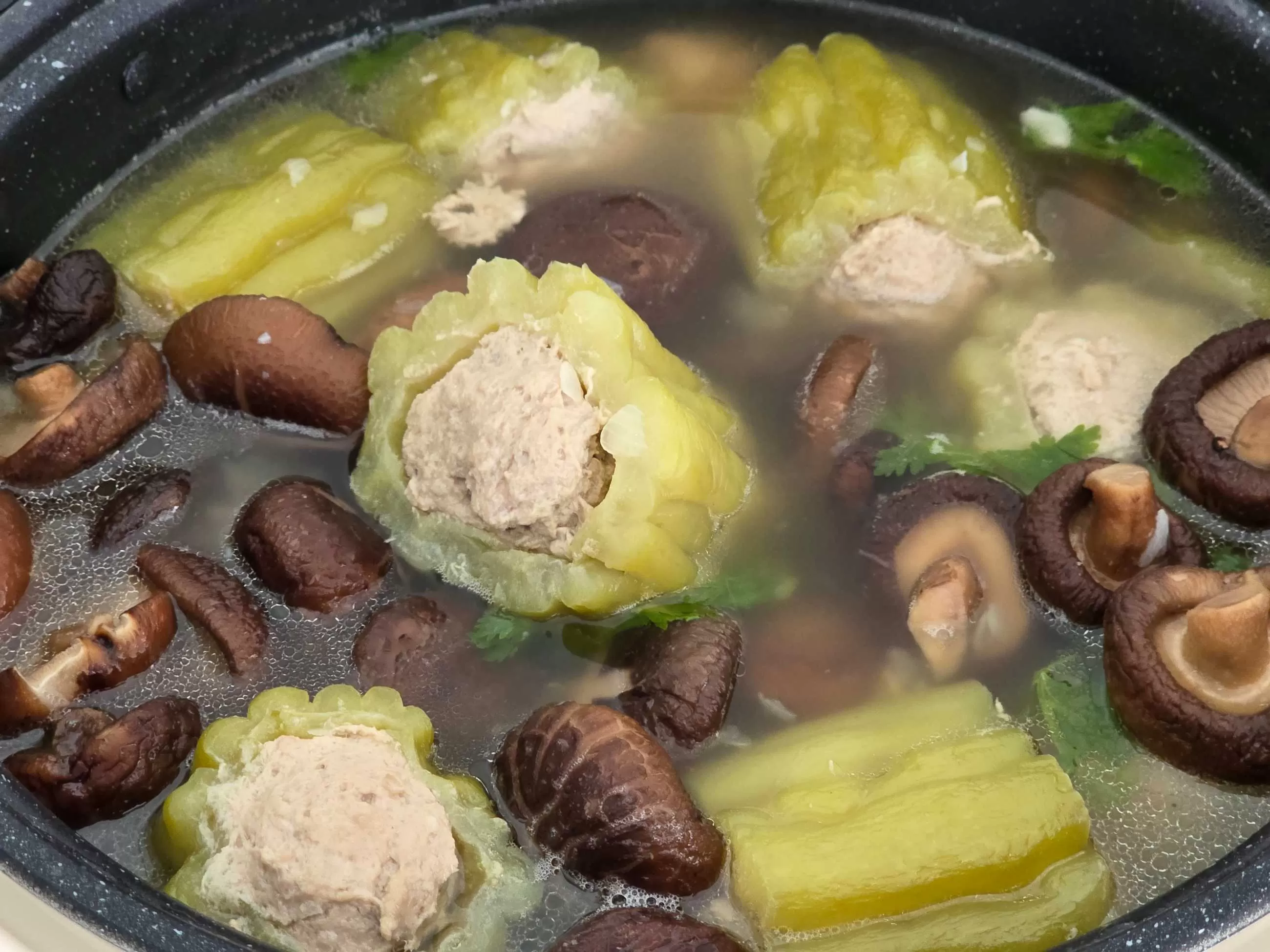 cooking-stuffed-bitter-melon-soup.webp